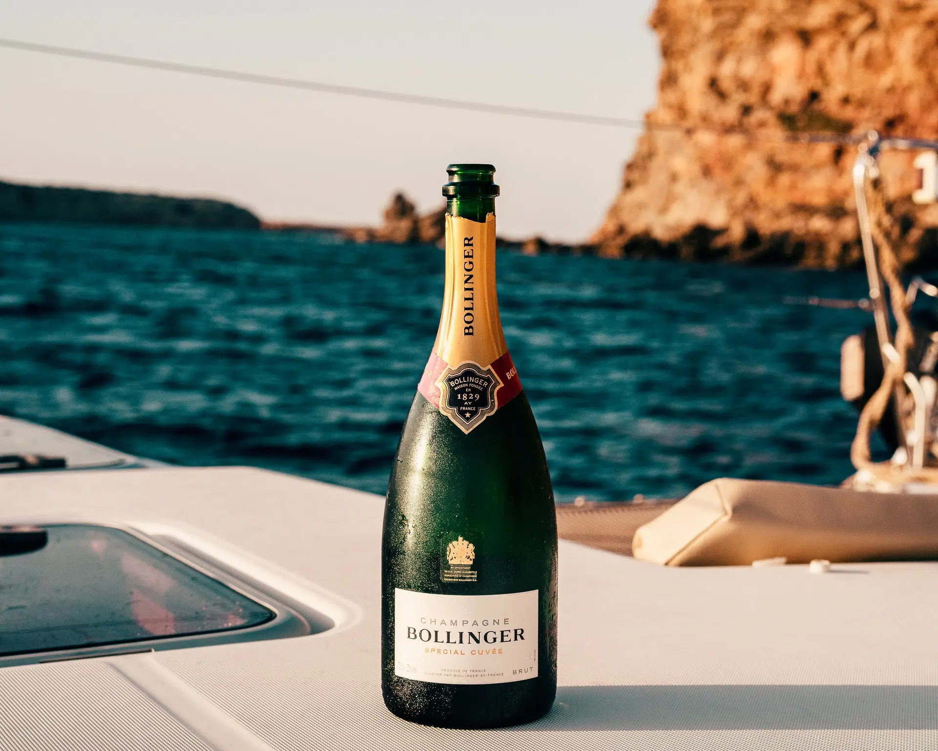 A bottle of wine on a boat